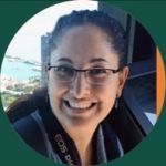 Business Leadership and Management grad Marina Vona smiling with MSU green framed around her photo.