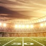 View of a football stadium from the 50 yard line.