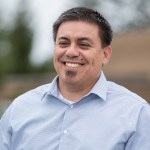 MS in supply chain management grad, Jesus Gomez, smiling.