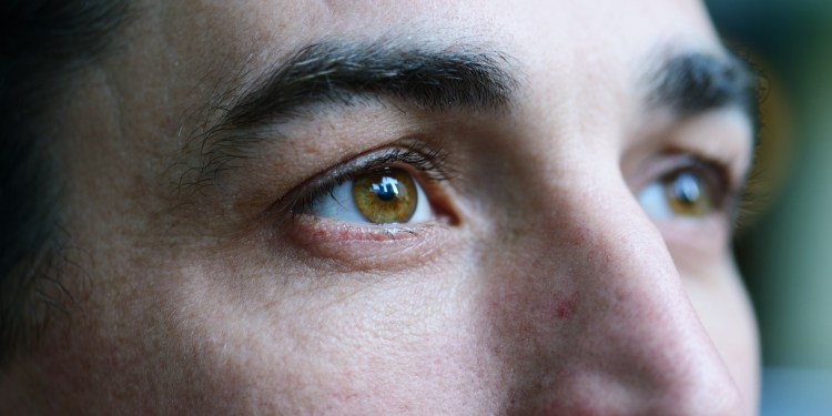 Closeup of a man looking away from the camera.