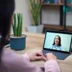 Doctor consults patient through tablet — telehealth in action