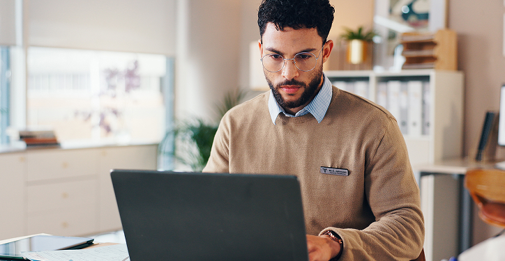 Male professional working on a laptop