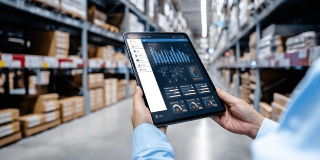 A professional analyzing data on a tablet